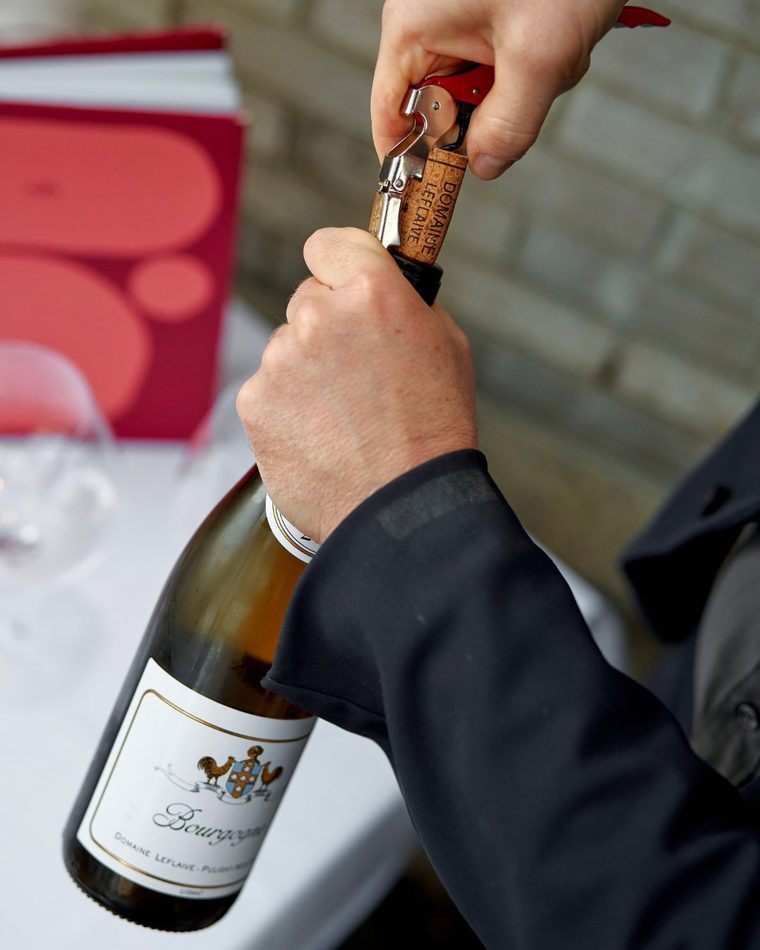 Opening a bottle at Cucina Alba